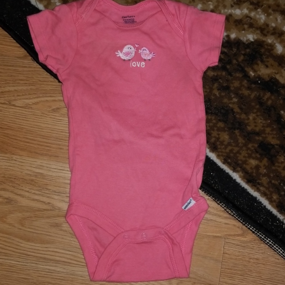 Two onesies size 6-9 months. Skirt size 6-9 months